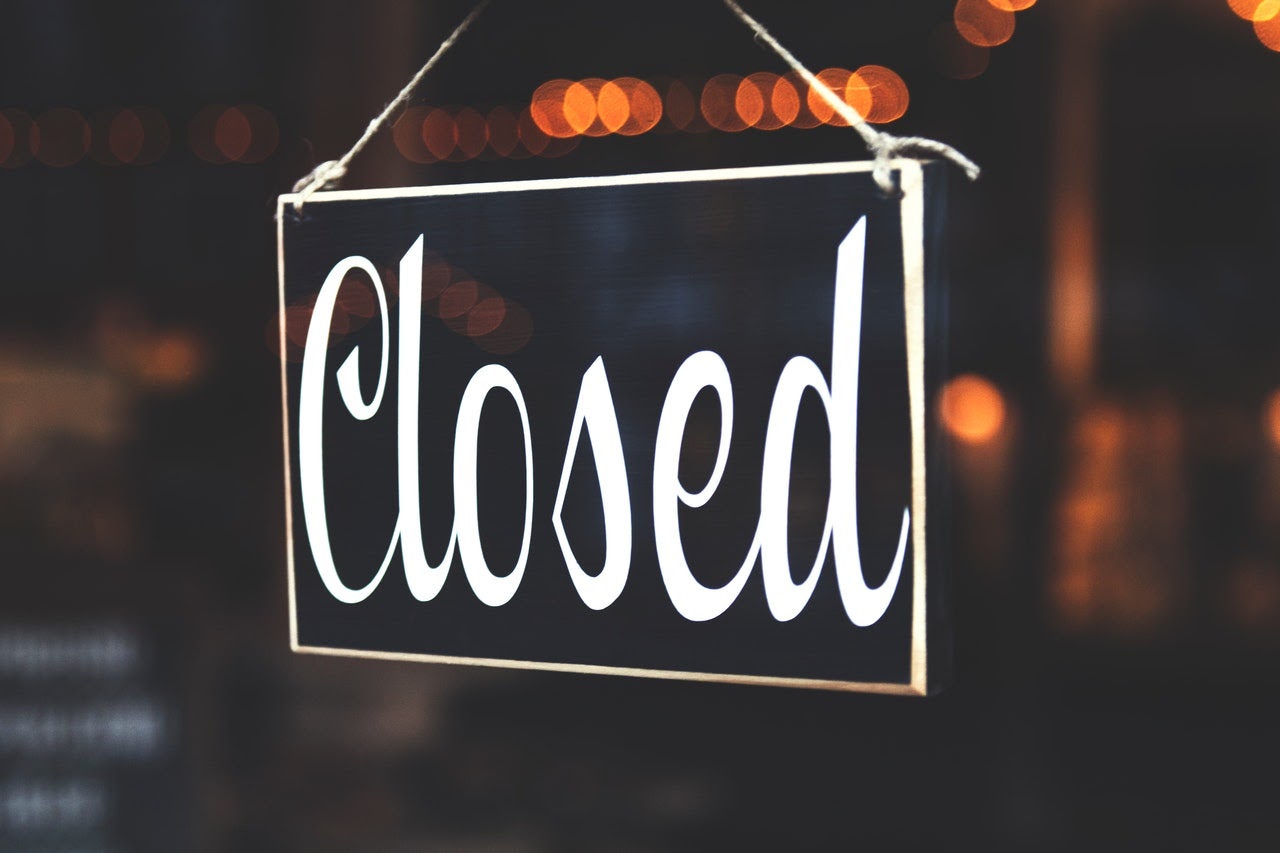 A closed sign, representing month end close in accounting